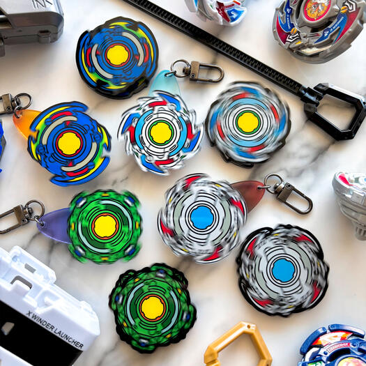 spinning keychain / magnet